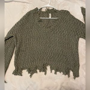 Distressed knit sweater